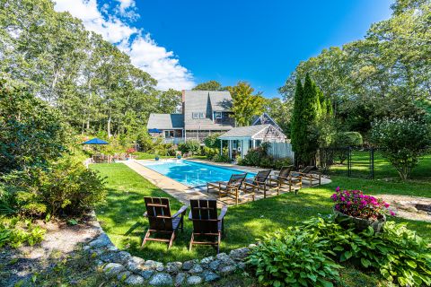 View across Pool to House, Patio areas and Yard