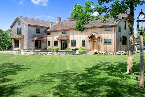 View of House coming up Driveway , Large Patio with Dining Table for 10 & Additional Seation